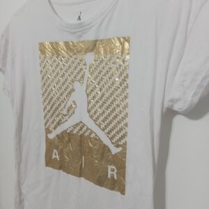 Air Jordan High Low Short Sleeve T Shirt Gold Shimmer Front. Split sides at hem